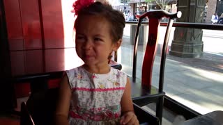 Toddler tries lemon, makes great face