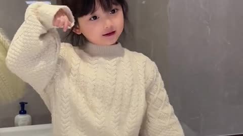 Very cool baby dancing in front of the mirror