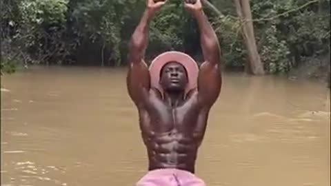 Natural Africa body builder Mr wad works out on