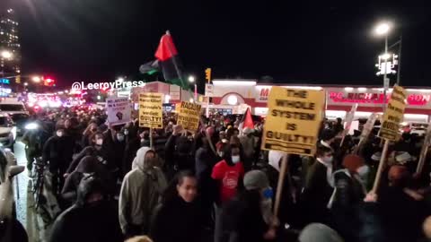 Activists shut down the streets of Brooklyn NY chant "Hey Hey Ho Ho Racist Cops Have To Go"