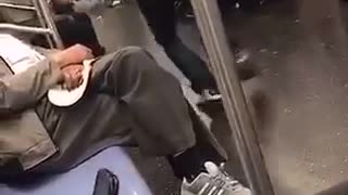 Guy grey hoodie dancing on subway