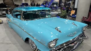 "Sky Blue Elegance: 1957 Bel Air Lowrider in Full Swing"