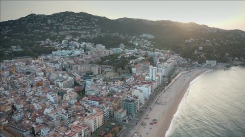 Aerial view of the Mediterranean resort of Lloret de Mar early morning sunrise from the hill