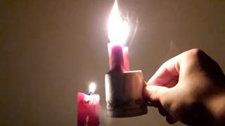 Extinguished Candle Skillfully Reignited in Slow Motion