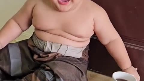 Reaction of Funny Chubby Boy Drink Coffee First Time