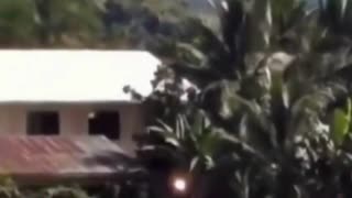 Orange Light Orb Floating in a Field: Daytime Sighting in the Philippines