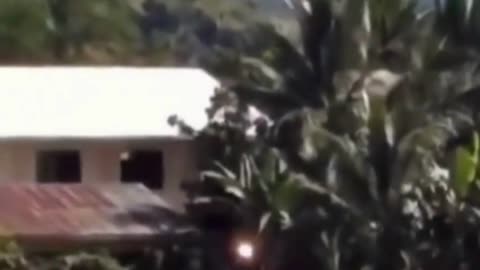 Orange Light Orb Floating in a Field: Daytime Sighting in the Philippines