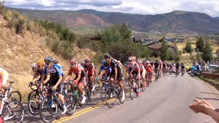 Motorbike crashes into cyclist at the USA Pro Challenge