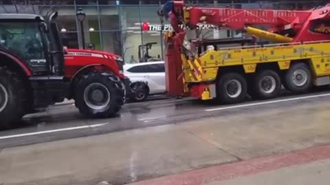 Tow Truckers Arrived in Ottawa, but Instead of Towing the Truckers, They Joined the Truckers