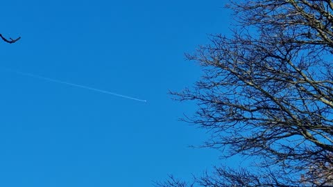 Condensation Trail From Airplane Above North Wales