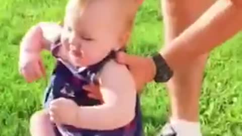 Very funny footages when little toddler hate to walk on grass
