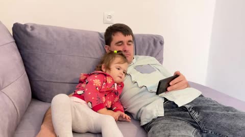 Cute_Baby_Watching_Cartoons_with_Dad