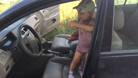 Baby dancing in a Car