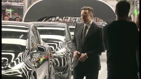 Elon Musk dancing as he opens new Tesla factory in Germany
