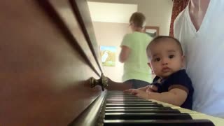 Patrick Playing Piano with Uncle Roo.