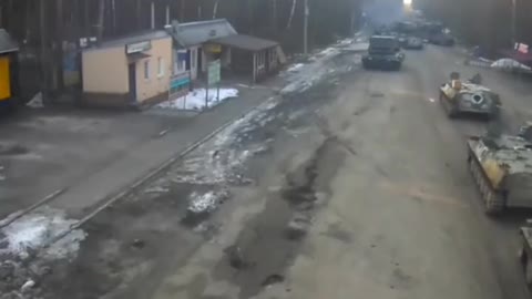 Russian troops crossing the Senkivka-Veselivka checkpoint at the Belarusian-Ukrainian border