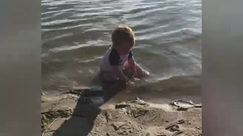 Funny babies playing with sand 😂😂