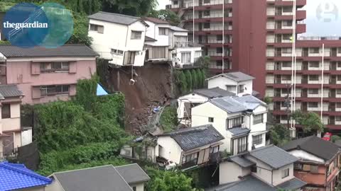 House crashes down hill after Japanese mudslide