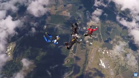 Skydiver takes a leap from 25,000 feet and lands safely in a net without using a parachute.