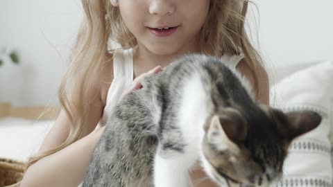 Baby Girls Playing With Dog