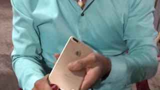Guy Attempts To Open Bottle With IPhone
