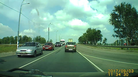 Combine Crushes Front of Car