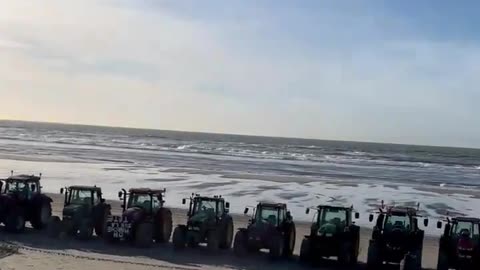 French farmers line the beach at Le Touquet in the Pas-de-Calais region,