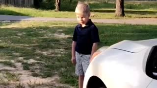 Kid Falls in Love with Car