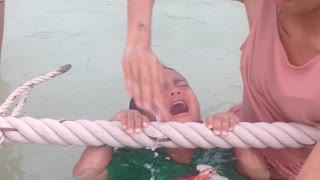 Little kid screams as he nearly drowns... not really