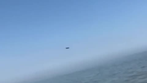 Fishermen in the Caspian Sea film two low-flying Russian cruise missiles passing by them