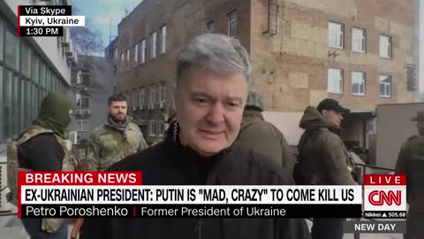 Former President of Ukraine Petro Poroshenko shows the weapons his group is holding and says he will hold out "forever" against Russian aggression