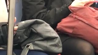 Woman smells and chews her hair on subway train