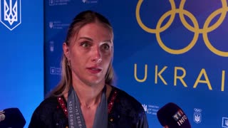 Ukrainian fencer says she has 'different emotions' after Olympics win