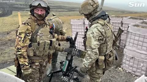 Russian special forces operate heavy weaponry during combat training