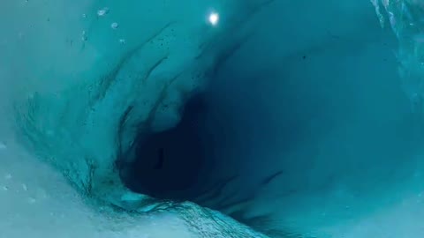 Don't fall into this giant ice tunnel in Alaska! It's on a very large glacier 🤯😍.