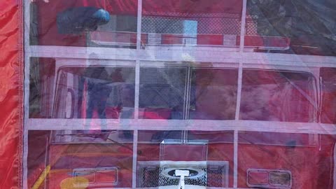 Spencer in bounce house at Merrick Fire Station Fall Event