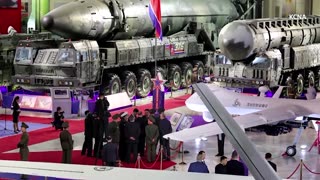 North Korea shows off banned missiles to Russia