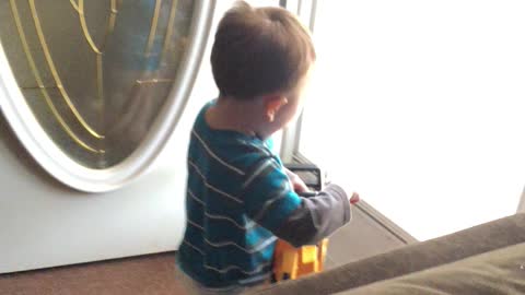 Toddler hilariously makes chainsaw noises with his chainsaw toy