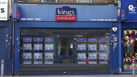 London shops board up windows in anticipation of more unrest | REUTERS