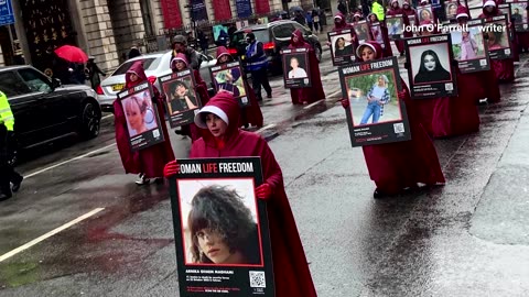 'Handmaids' rally in London for Iranian women