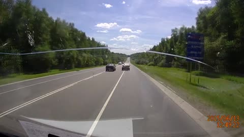 Dashcam captures sofa crashing into a car