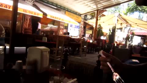 Outdoor cafe during daily prayer - Istanbul, Turkey [HD video]