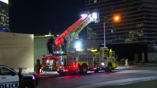 Officers conduct a rooftop search for suspect