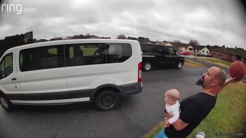 Rebound master performs unbelievable trick shot with baby in hand