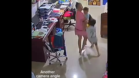 Mother rescue her kids from falling roof