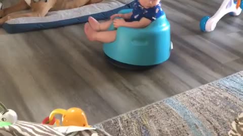 Baby Enjoys Ride on Roomba Vacuum