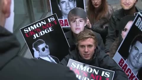 x factor week 35 simon cowell protest