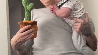 4-Month-Old Child Argues With Dancing Cactus