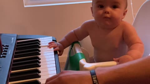 Baby Gus Grooves to Piano Playing