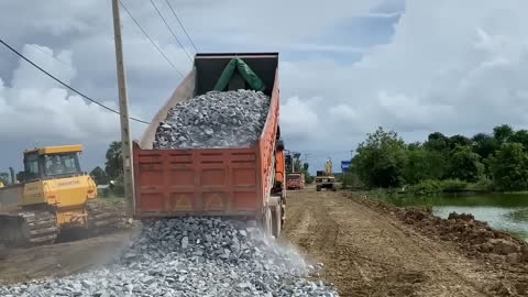 New bulldozer spreading gravel processing features building road foundation-8